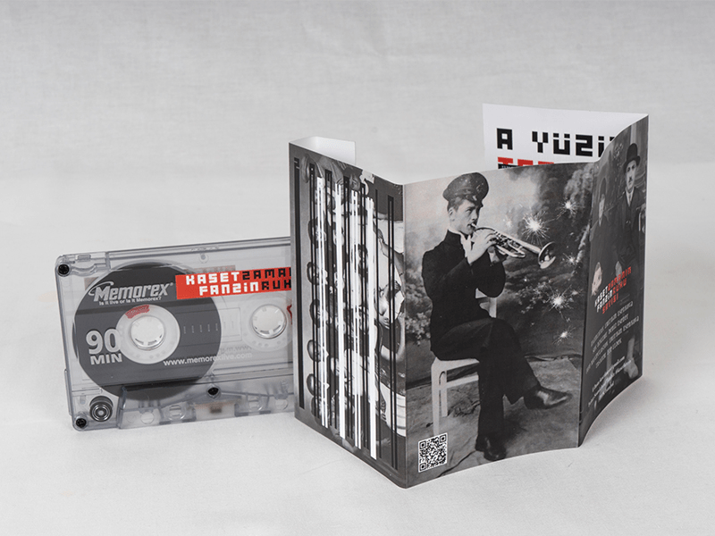 Cassette tape and folded booklet of Cassette Fanzine: The Spirit of Time, which includes the sound work S'nek