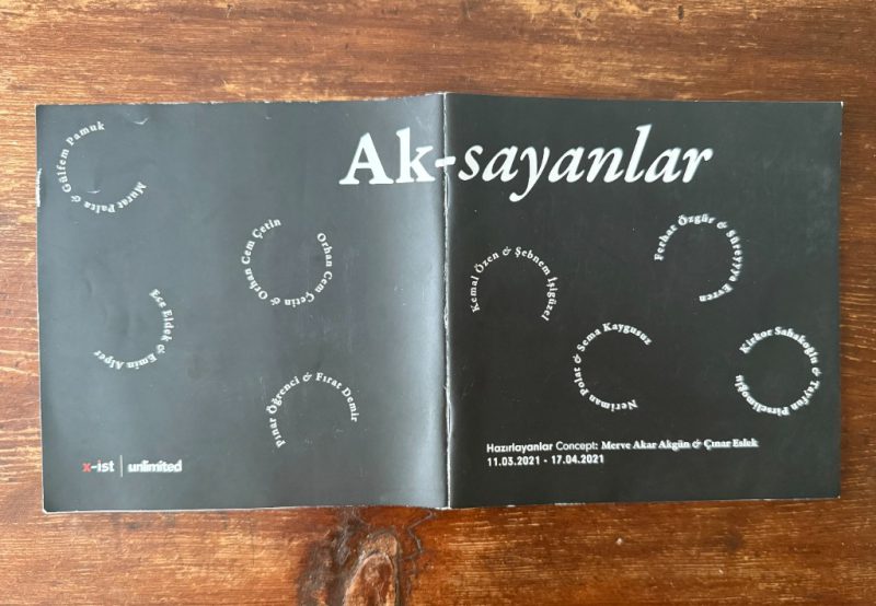 Open cover of the exhibition publication Ak-sayanlar, x-ist | unlimited, 2021