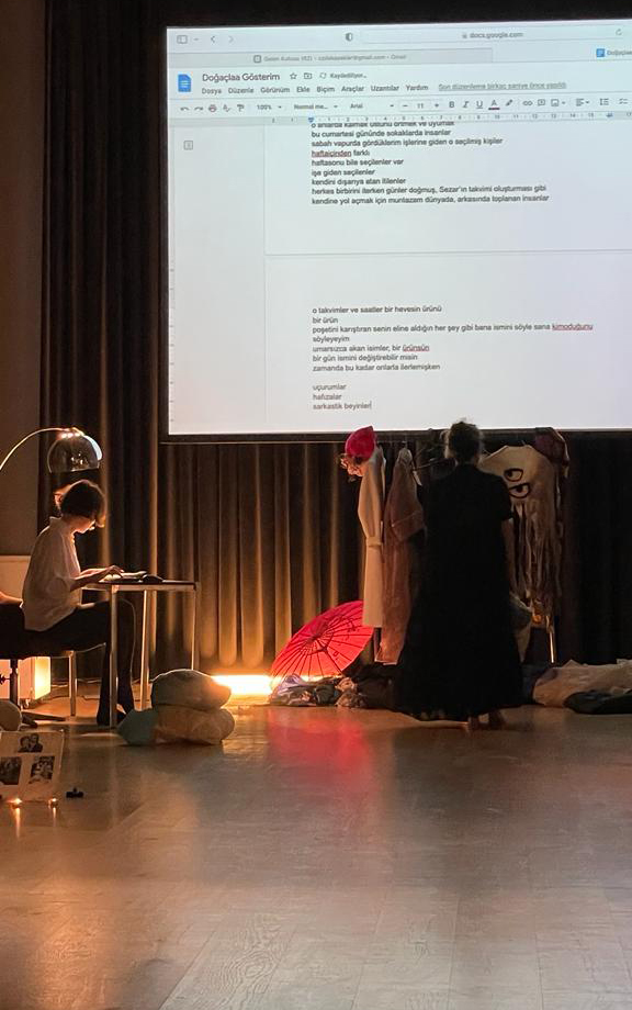 Improvised poems projected on a screen during impromptu display at SALT Galata